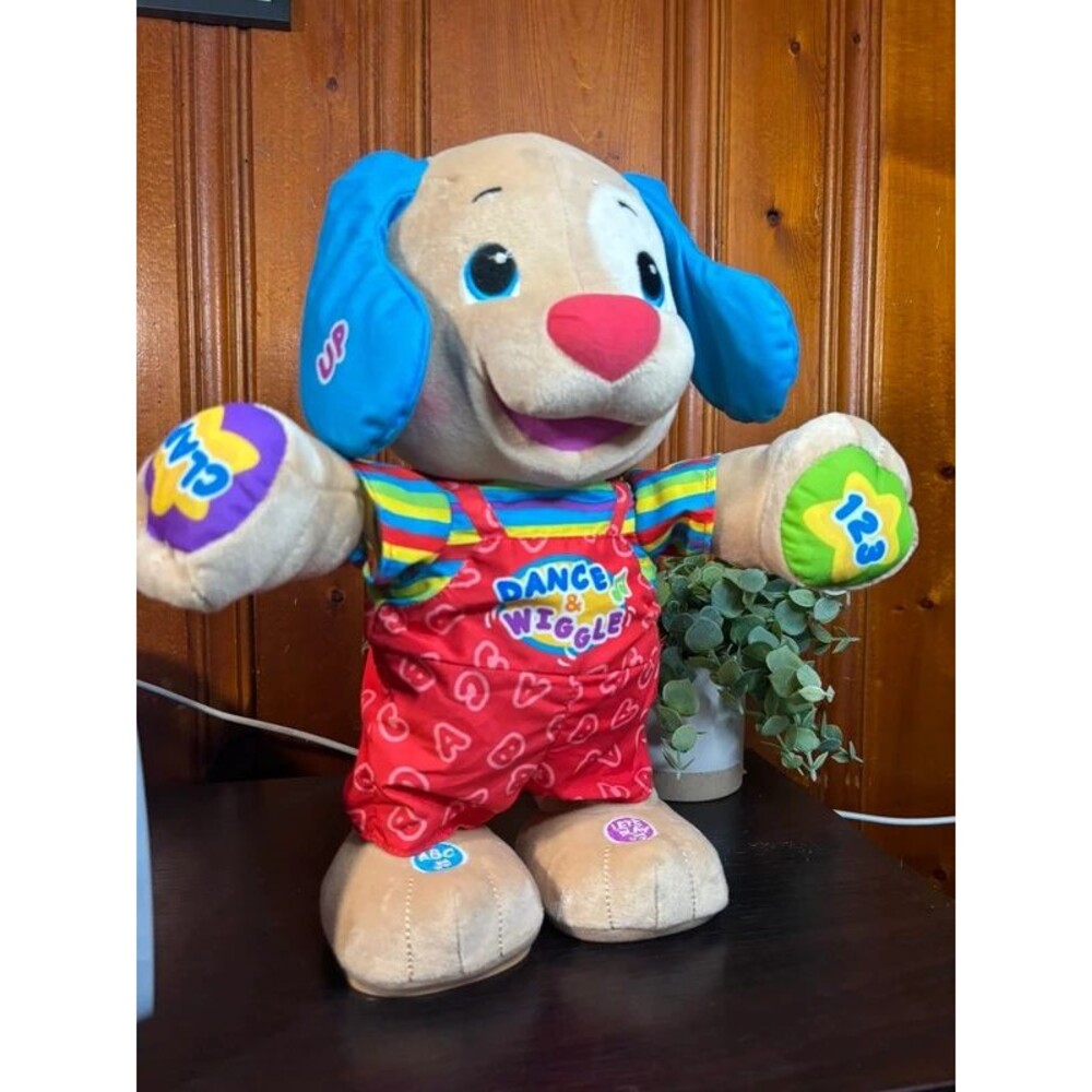 Vintage 2000s Fisher-Price toy and dance puppy